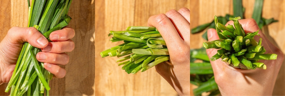 A hand holding a bunch of green garlic chives, shown from three different angles on a wooden surface: front view, side view, and top view.